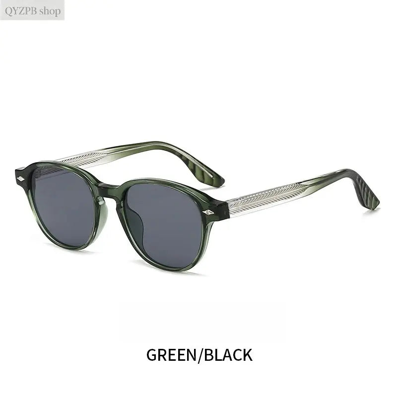 retro round-frame sunglasses featuring a transparent, tinted grey-green