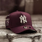 New Era New York Yankees Yankee Stadium 75th Anniversary 9FORTY A-Frame Snapback Cap in a dark maroon colorway