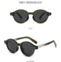 retro round-frame sunglasses featuring dark tinted lenses and dual-dot rivet accents