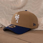 New Era MLB Los Angeles Dodgers "Upside Down" Logo 9FORTY A-Frame Snapback Hat in the Khaki / Royal Blue colorway.
